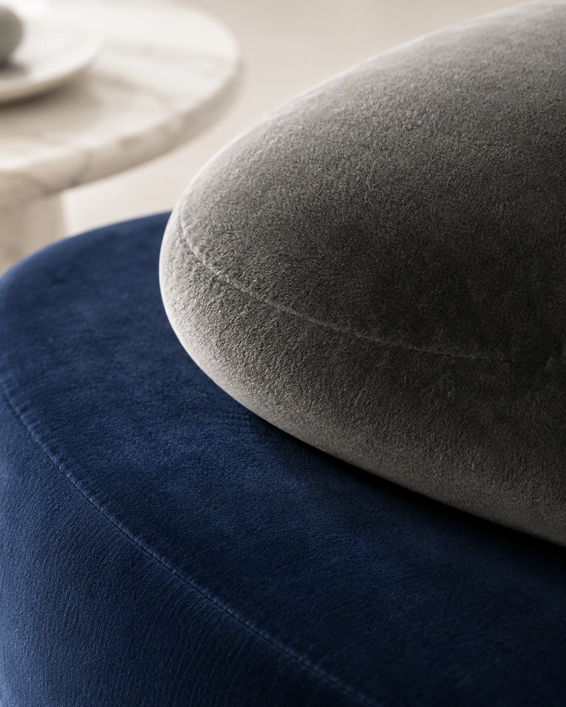 Close detail of navy velvet and charcoal upholstery