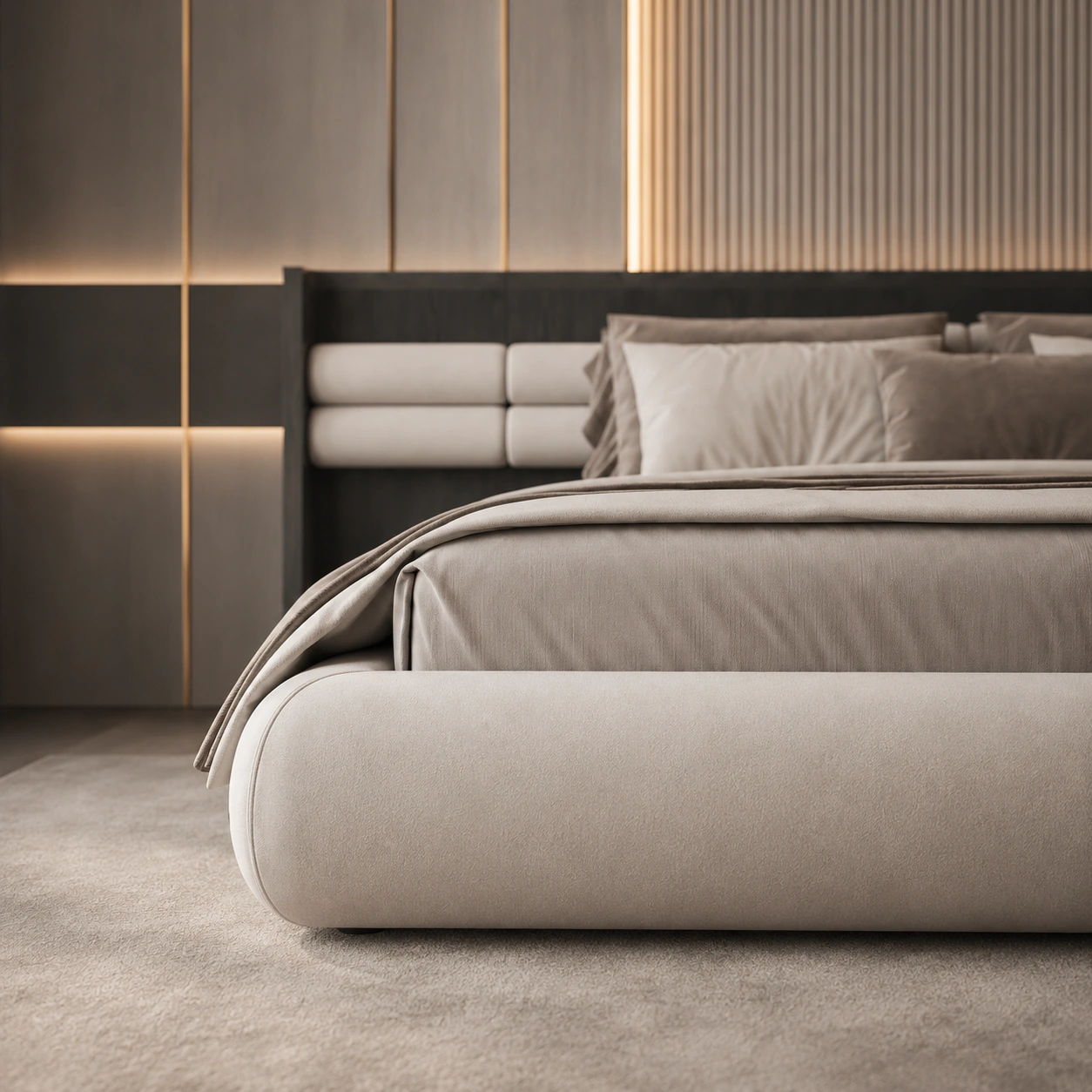 Angled view of a softly rounded ivory upholstered bed