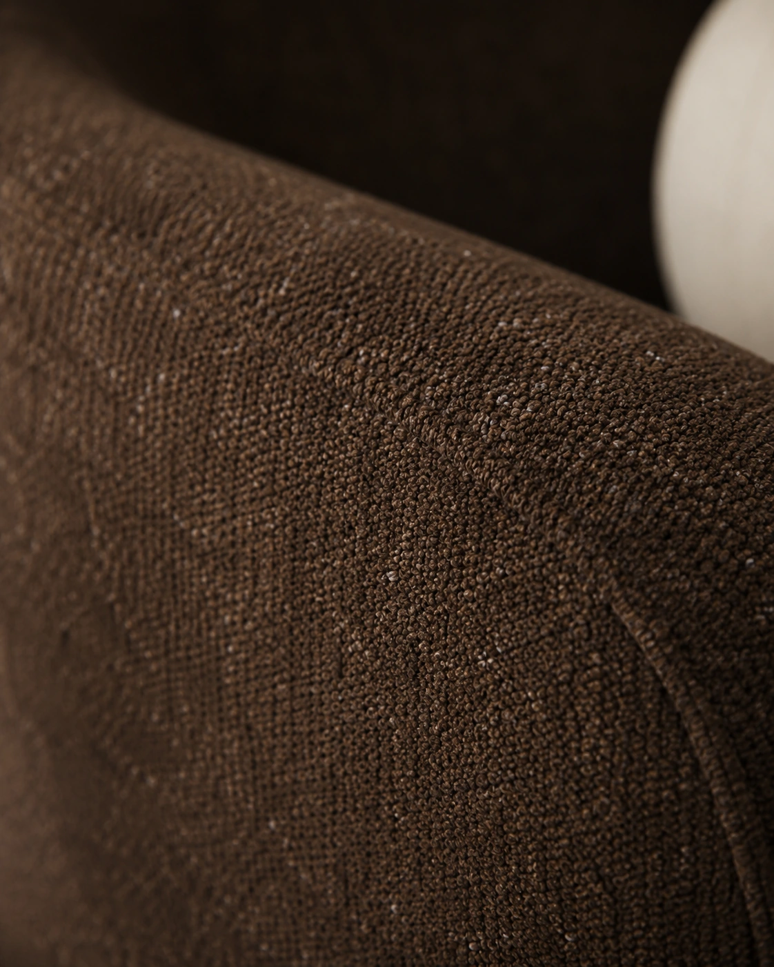 Macro detail of the dark woven upholstery