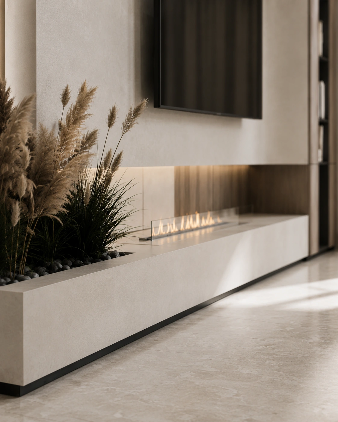 Close view of a pale sculptural media wall and integrated fireplace